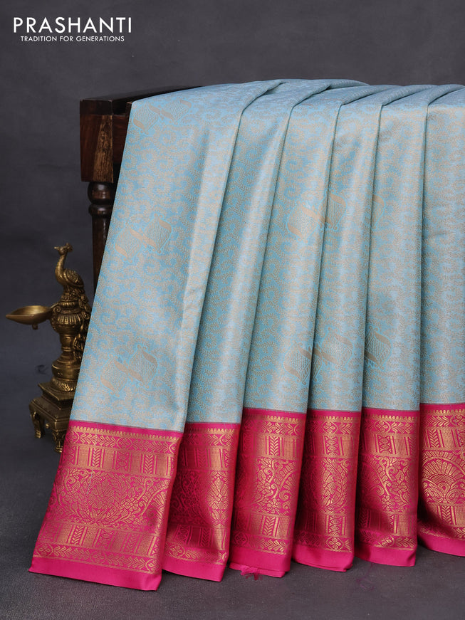 Tissue semi kanchipuram saree light blue and pink with allover zari woven brocade weaves and rich zari woven korvai border