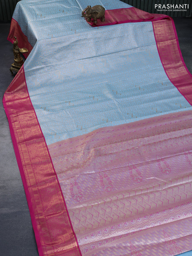 Tissue semi kanchipuram saree light blue and pink with allover zari woven brocade weaves and rich zari woven korvai border