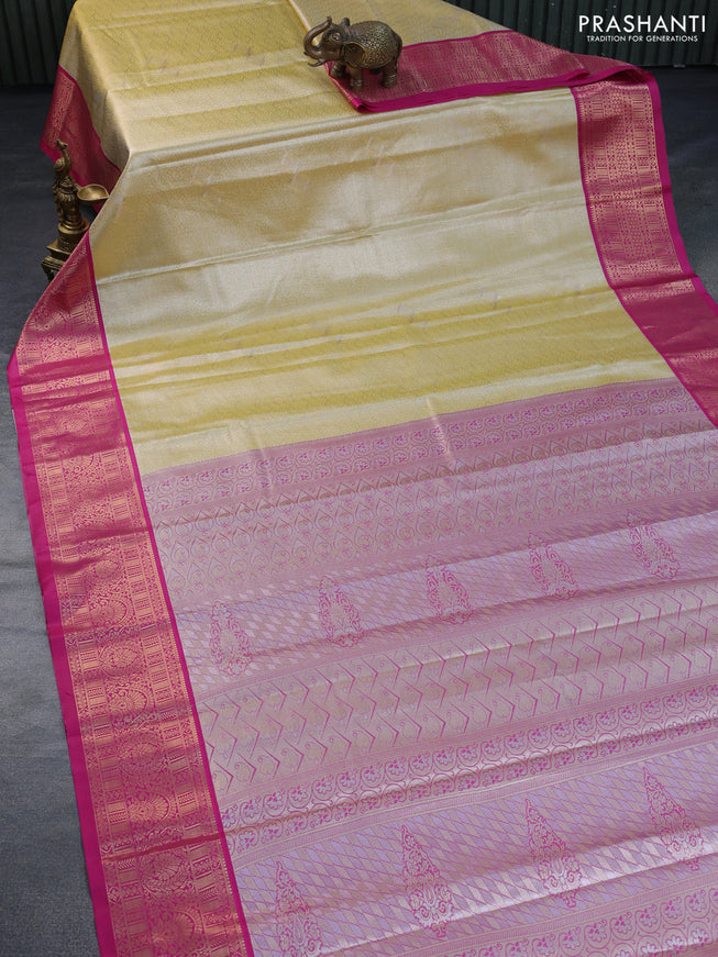 Tissue semi kanchipuram saree pale yellow and pink with allover zari woven brocade weaves and zari woven korvai border