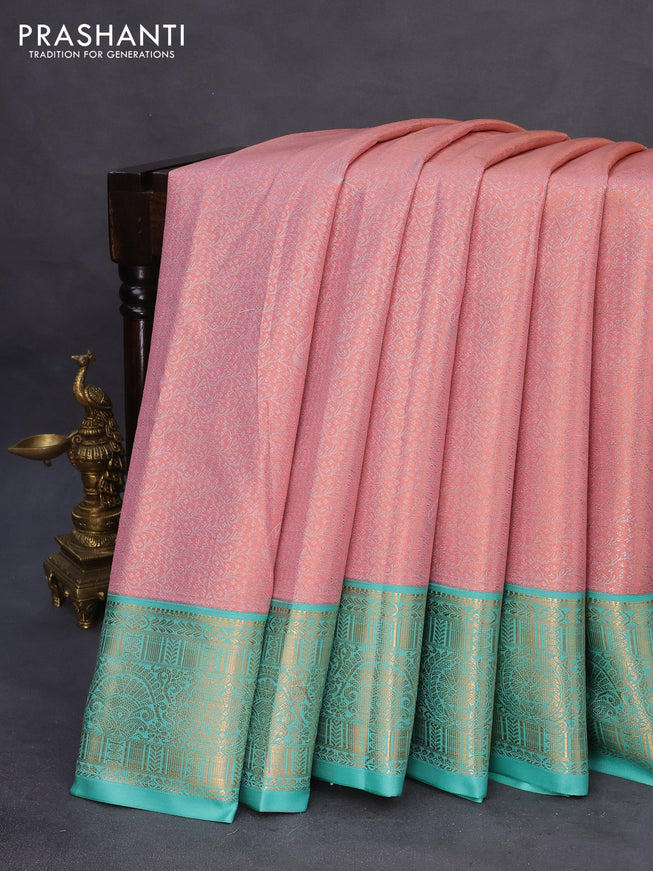 Tissue semi kanchipuram saree peach pink and teal green with allover silver zari woven brocade weaves and zari woven korvai border