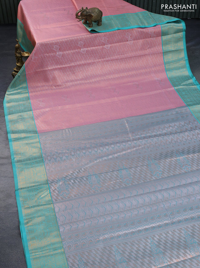 Tissue semi kanchipuram saree peach pink and teal green with allover silver zari woven brocade weaves and zari woven korvai border