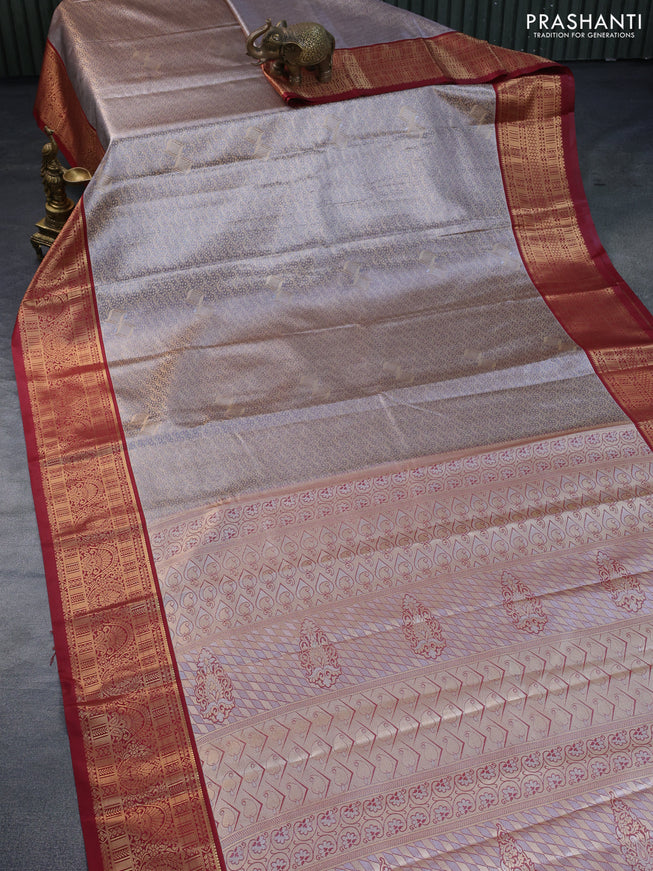 Tissue semi kanchipuram saree dual shade of grey and maroon with allover zari woven brocade weaves and zari woven korvai border