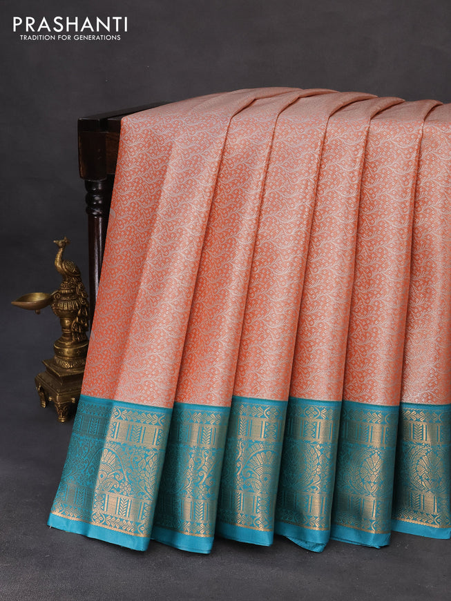 Tissue semi kanchipuram saree orange and cs blue with allover silver zari woven brocade weaves and zari woven korvai border