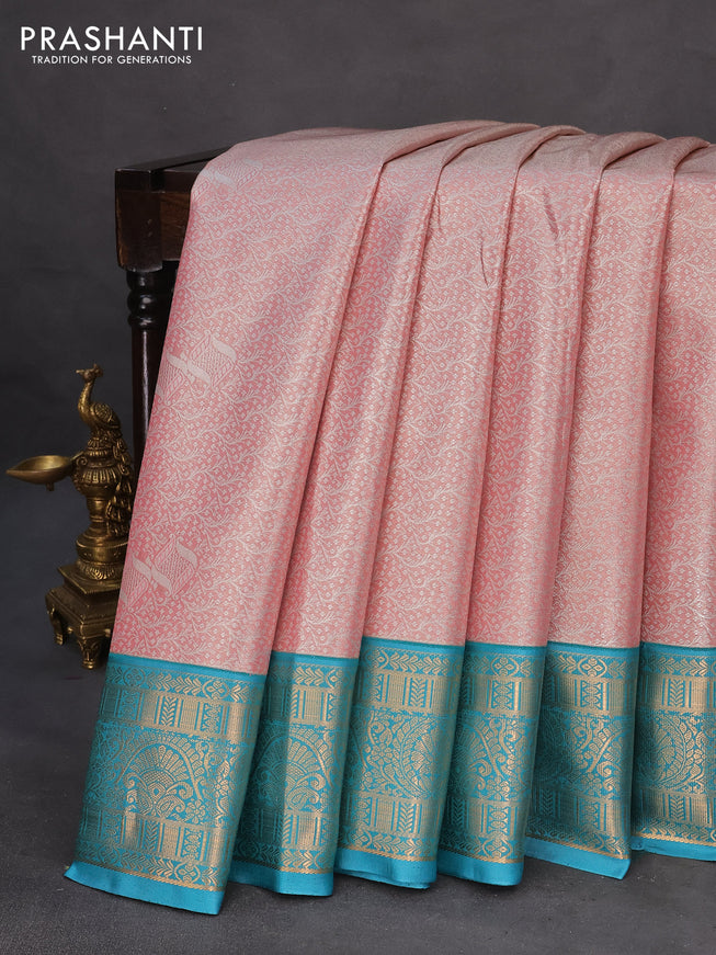 Tissue semi kanchipuram saree light pink and cs blue with allover zari woven brocade weaves and rich zari woven korvai border