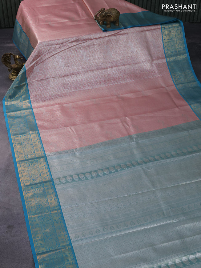 Tissue semi kanchipuram saree light pink and cs blue with allover zari woven brocade weaves and rich zari woven korvai border