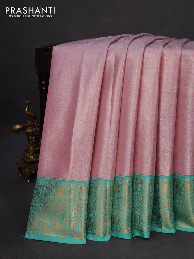 Tissue semi kanchipuram saree baby pink and teal green with allover zari woven brocade weaves and rich zari woven korvai border