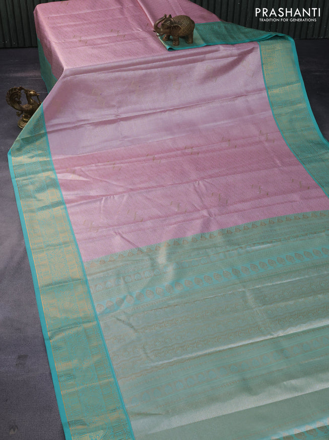 Tissue semi kanchipuram saree baby pink and teal green with allover zari woven brocade weaves and rich zari woven korvai border