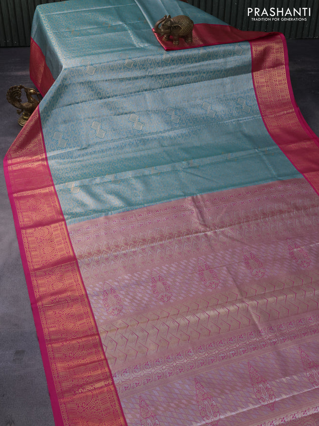 Tissue semi kanchipuram saree teal green and pink with allover zari woven brocade weaves and rich zari woven korvai border