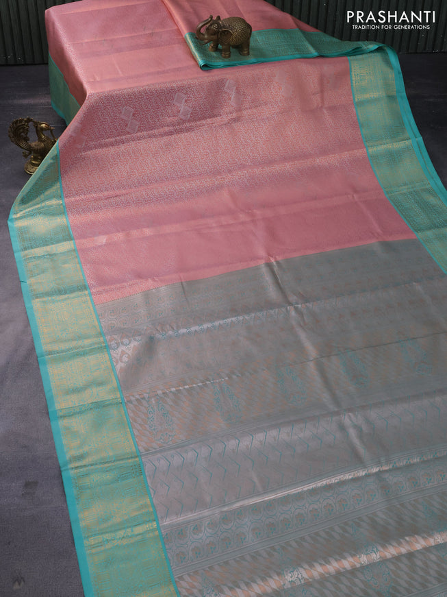 Tissue semi kanchipuram saree peach pink and teal green with allover zari woven brocade weaves and rich zari woven korvai border