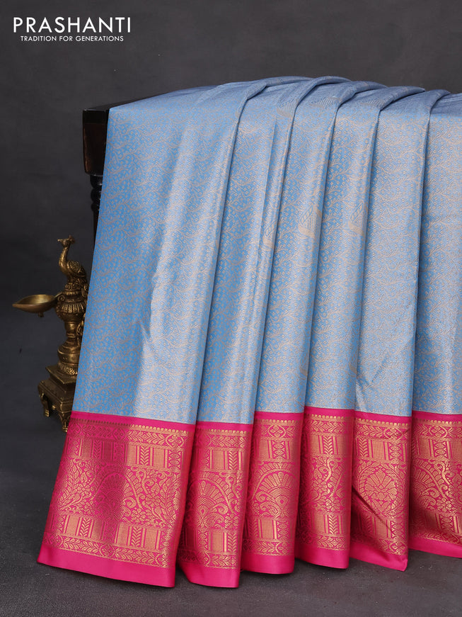 Tissue semi kanchipuram saree light blue and pink with allover zari woven brocade weaves and rich zari woven korvai border