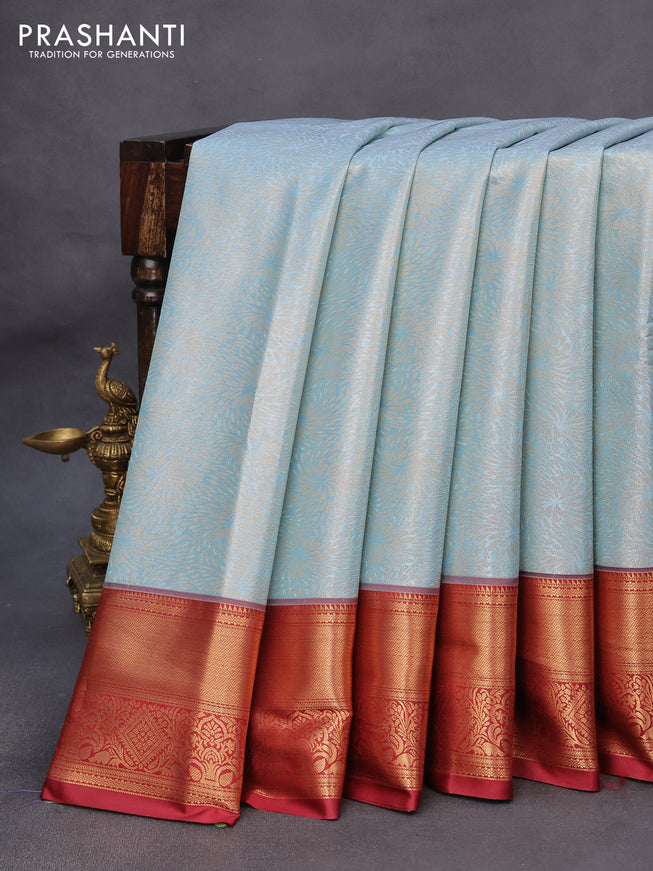 Tissue semi kanchipuram saree light blue and maroon with allover zari woven brocade weaves and zari woven border