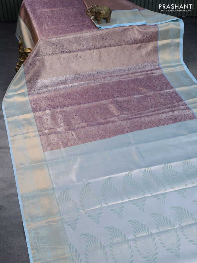 Tissue semi kanchipuram saree dark sandal and light blue with allover zari woven brocade weaves and zari woven border