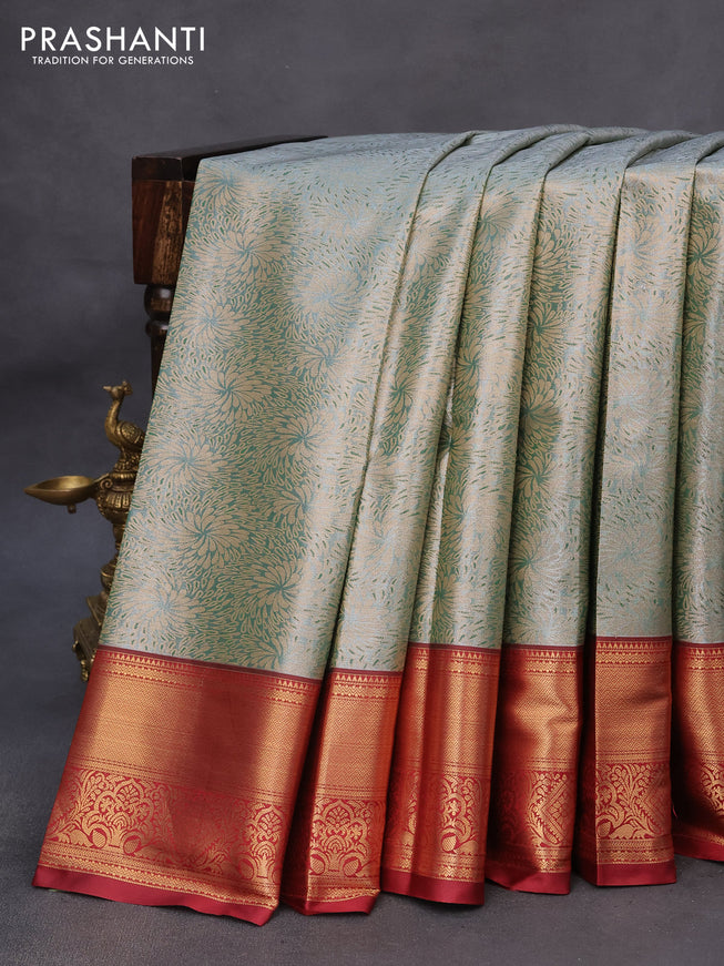 Tissue semi kanchipuram saree pastel green shade and maroon with allover zari woven brocade weaves and zari woven border