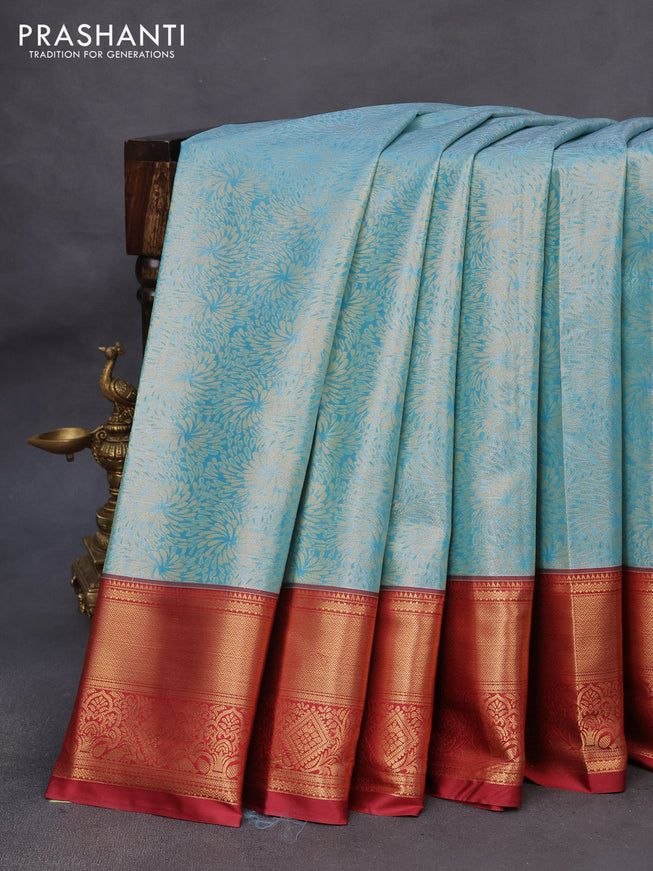 Tissue semi kanchipuram saree teal blue shade and maroon with allover zari woven brocade weaves and zari woven border