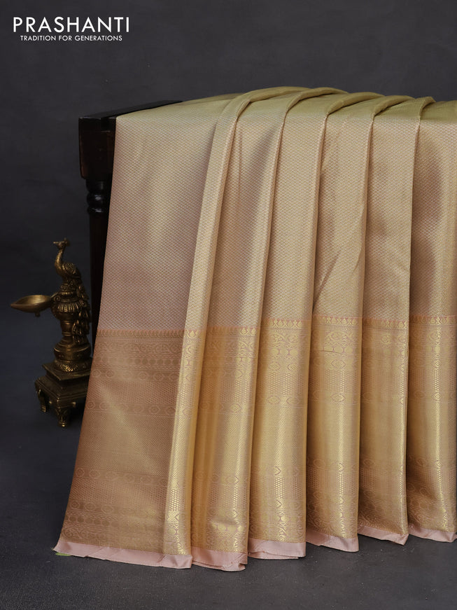 Tissue semi kanchipuram saree mustard shade and sandal with allover zari woven brocade weaves and long zari woven border