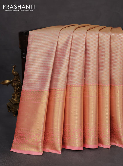 Tissue semi kanchipuram saree peach shade with allover zari woven brocade weaves and long zari woven border