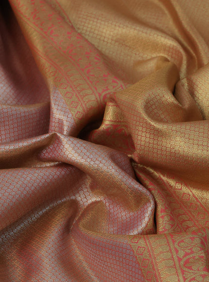 Tissue semi kanchipuram saree peach shade with allover zari woven brocade weaves and long zari woven border