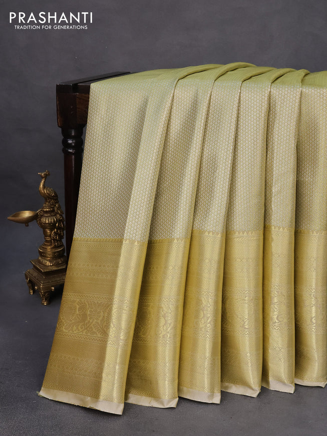 Tissue semi kanchipuram saree yellow and beige with allover silver zari woven brocade weaves and long zari woven border