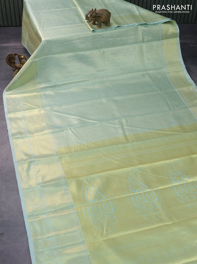 Tissue semi kanchipuram saree pastel green with allover silver zari woven brocade weaves and long zari woven border