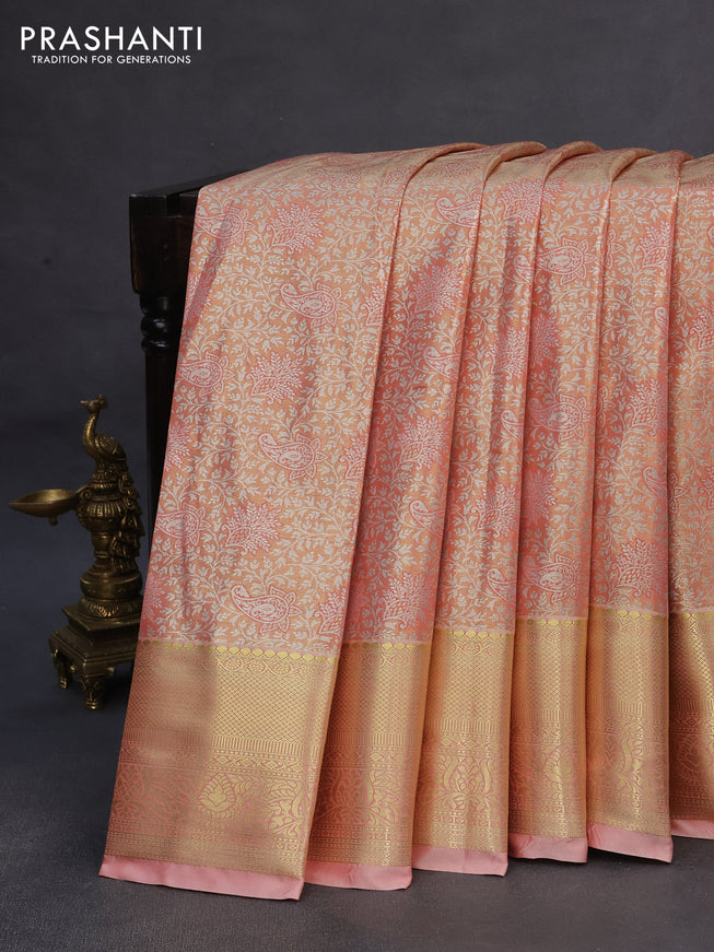 Tissue semi kanchipuram saree dual shade of peach with allover silver zari woven brocade weaves and zari woven border