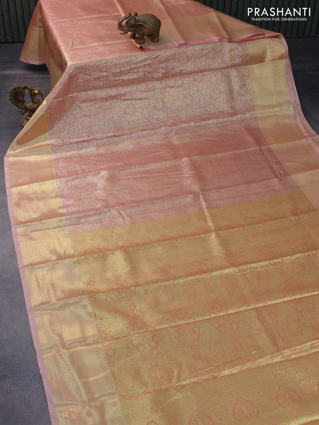 Tissue semi kanchipuram saree dual shade of peach with allover silver zari woven brocade weaves and zari woven border