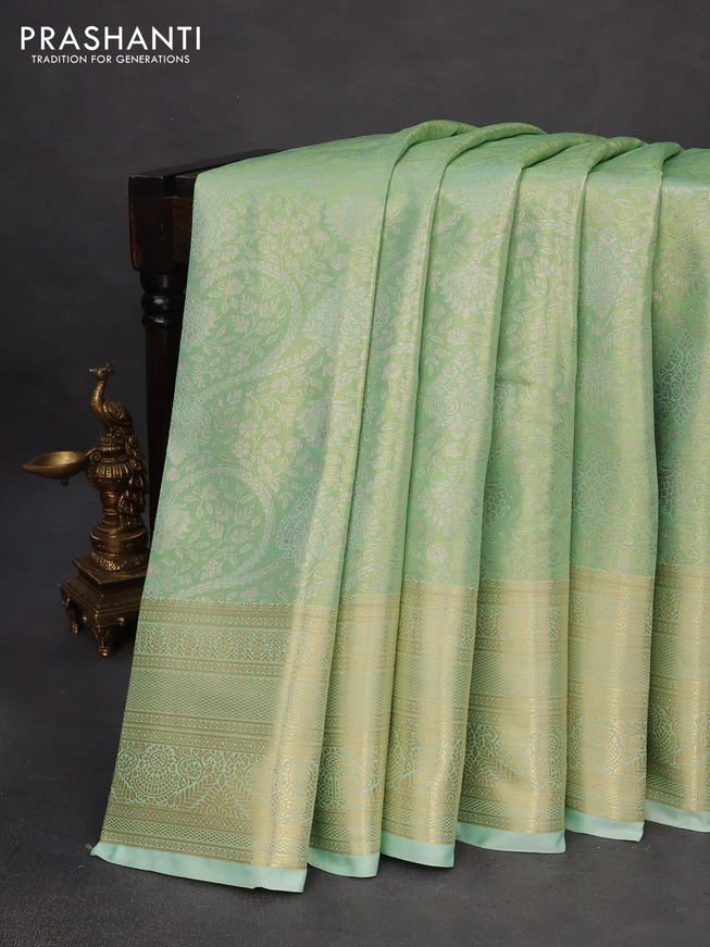 Tissue semi kanchipuram saree light green with allover silver zari woven brocade weaves and long zari woven border