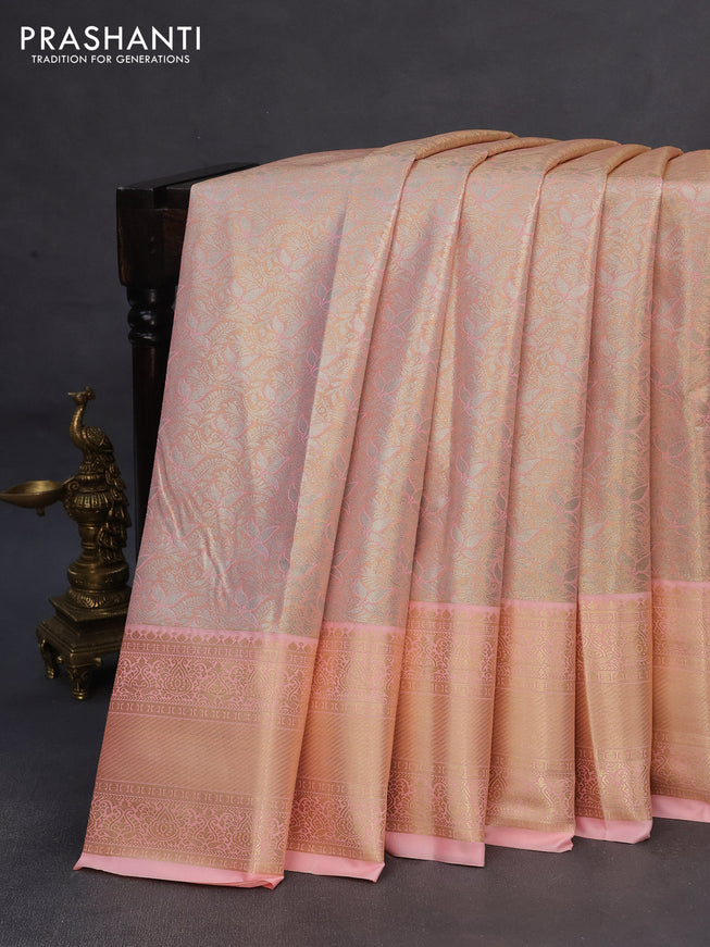 Tissue semi kanchipuram saree dual shade of peach pink with allover silver zari woven brocade weaves and zari woven border