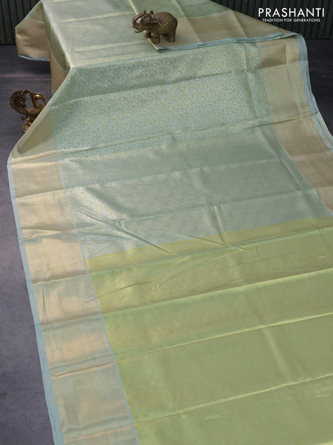 Tissue semi kanchipuram saree pastel green and pastel grey with allover silver zari woven brocade weaves and zari woven border