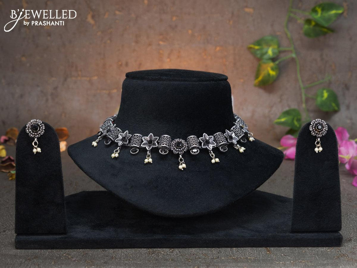 Oxidised necklace floral design with black stones and pearl hangings