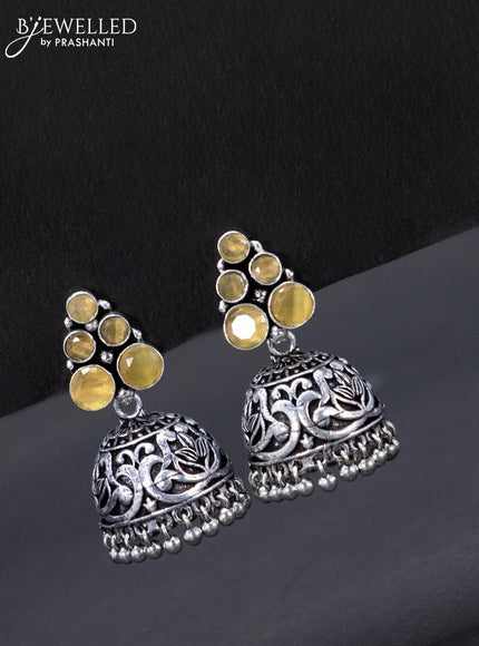 Oxidised jhumka with yellow stone and hangings