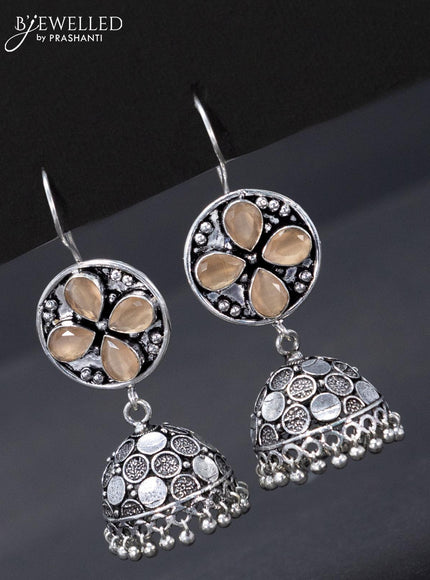 Oxidised hanging type jhumka with peach stone and hangings