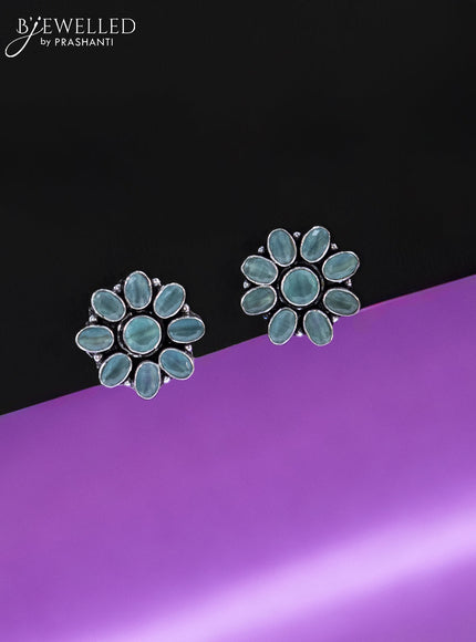 Oxidised earrings floral design with mint green stones