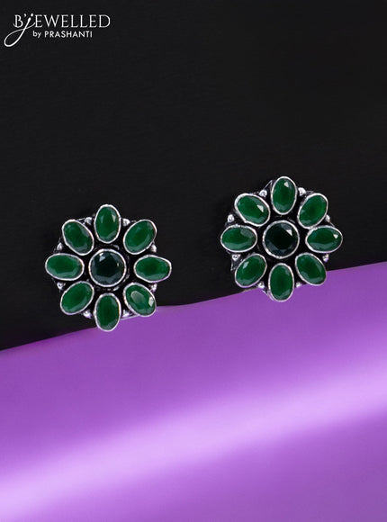 Oxidised earrings floral design with emerald stones