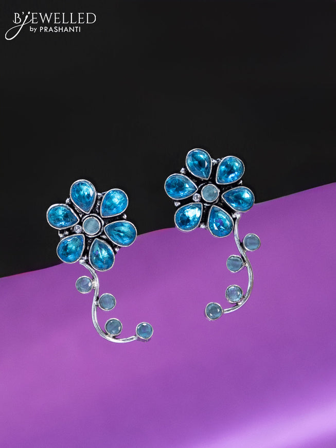 Oxidised earrings floral design with ice blue stones