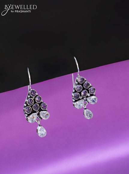 Oxidised hanging type earring with violet and white stones