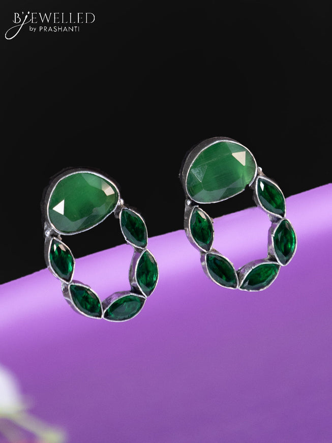 Oxidised earrings with emerald stones