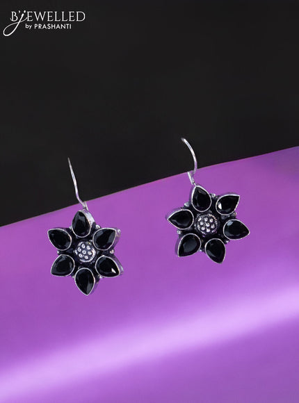 Oxidised hanging type earring floral design with black stones