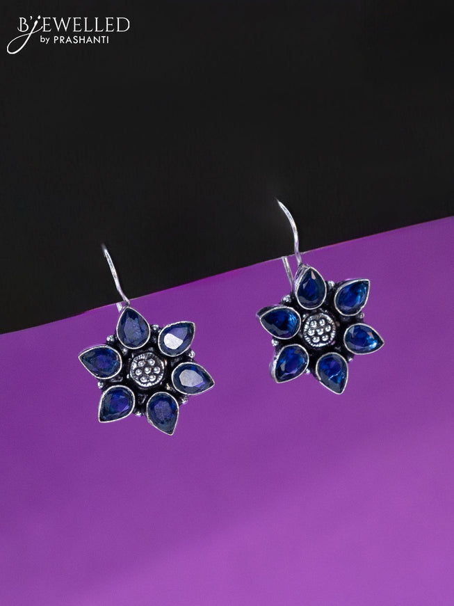 Oxidised hanging type earring floral design with sapphire stones