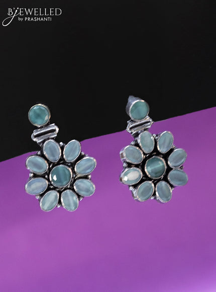 Oxidised earrings with mint green stones