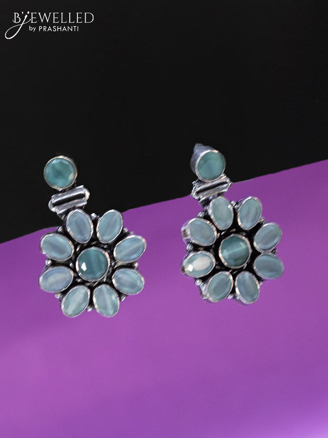 Oxidised earrings with mint green stones