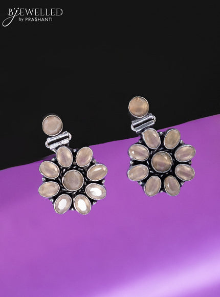 Oxidised earrings with peach stones