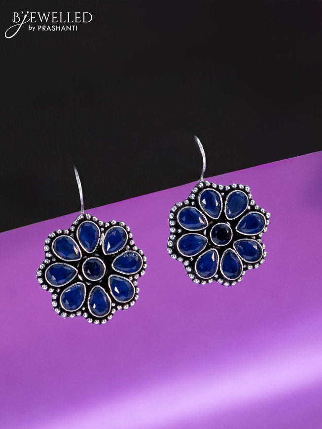 Oxidised hanging type earring floral design with sapphire stones