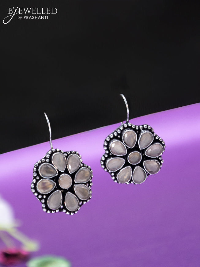 Oxidised hanging type earring floral design with peach stones