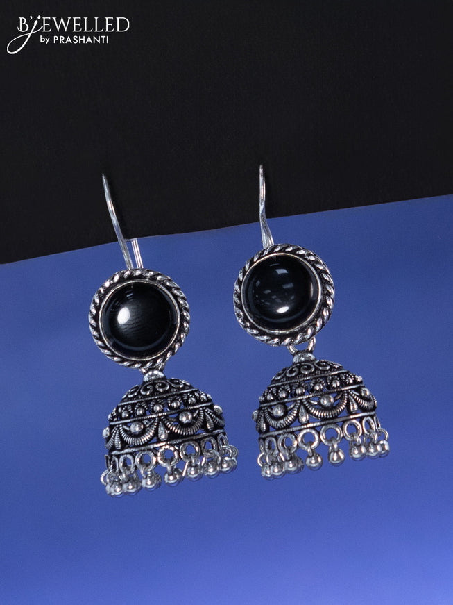 Oxidised hanging type jhumka with black stone and hangings