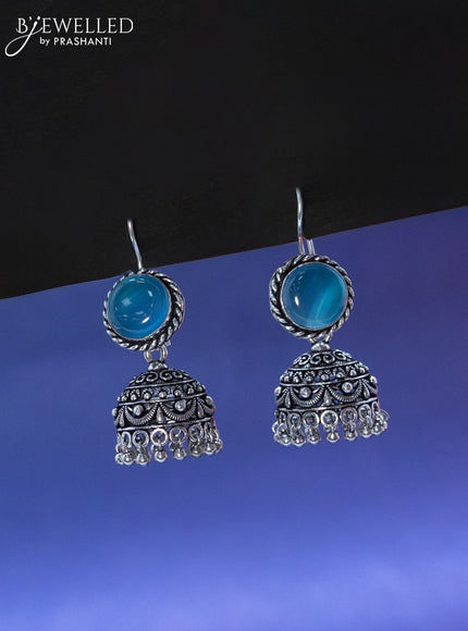 Oxidised hanging type jhumka with ice blue stone and hangings