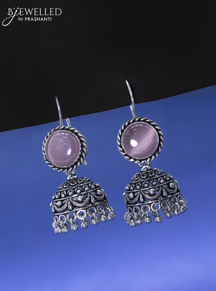 Oxidised hanging type jhumka with baby pink stone and hangings