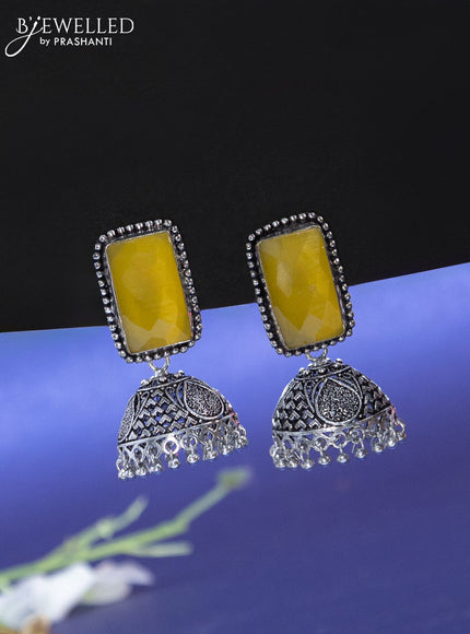 Oxidised jhumka with yellow stone and hangings