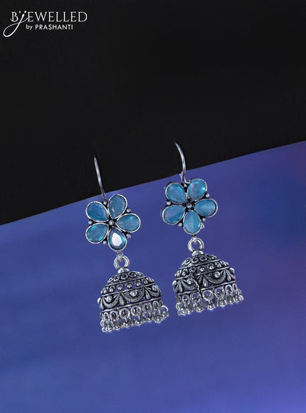 Oxidised hanging type jhumka floral design with ice blue stone and hangings