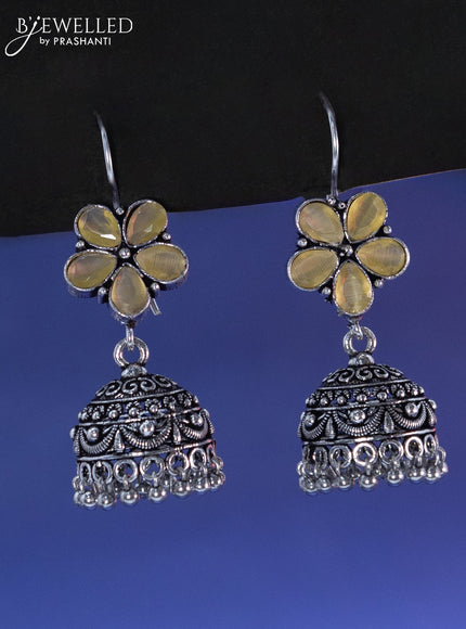 Oxidised hanging type jhumka floral design with yellow stone and hangings