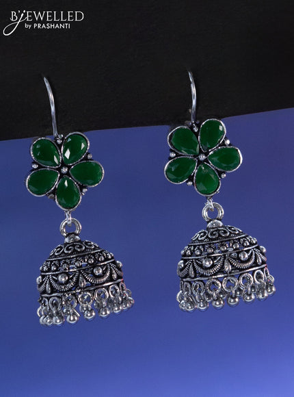 Oxidised hanging type jhumka floral design with emerald stone and hangings